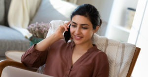 Woman speaking with a voice-based AI assistant