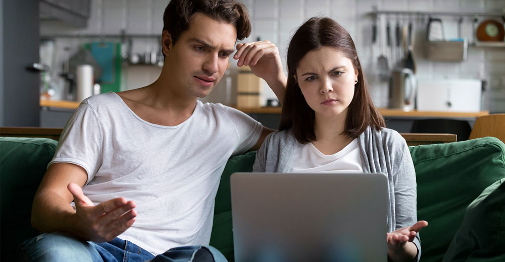 millennial couple online frustrated by poor customer experience